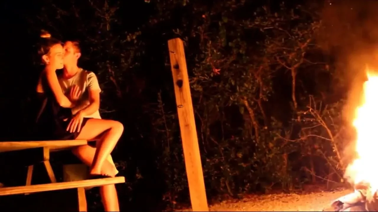 Teen amateur couple fucking outside by the campfire