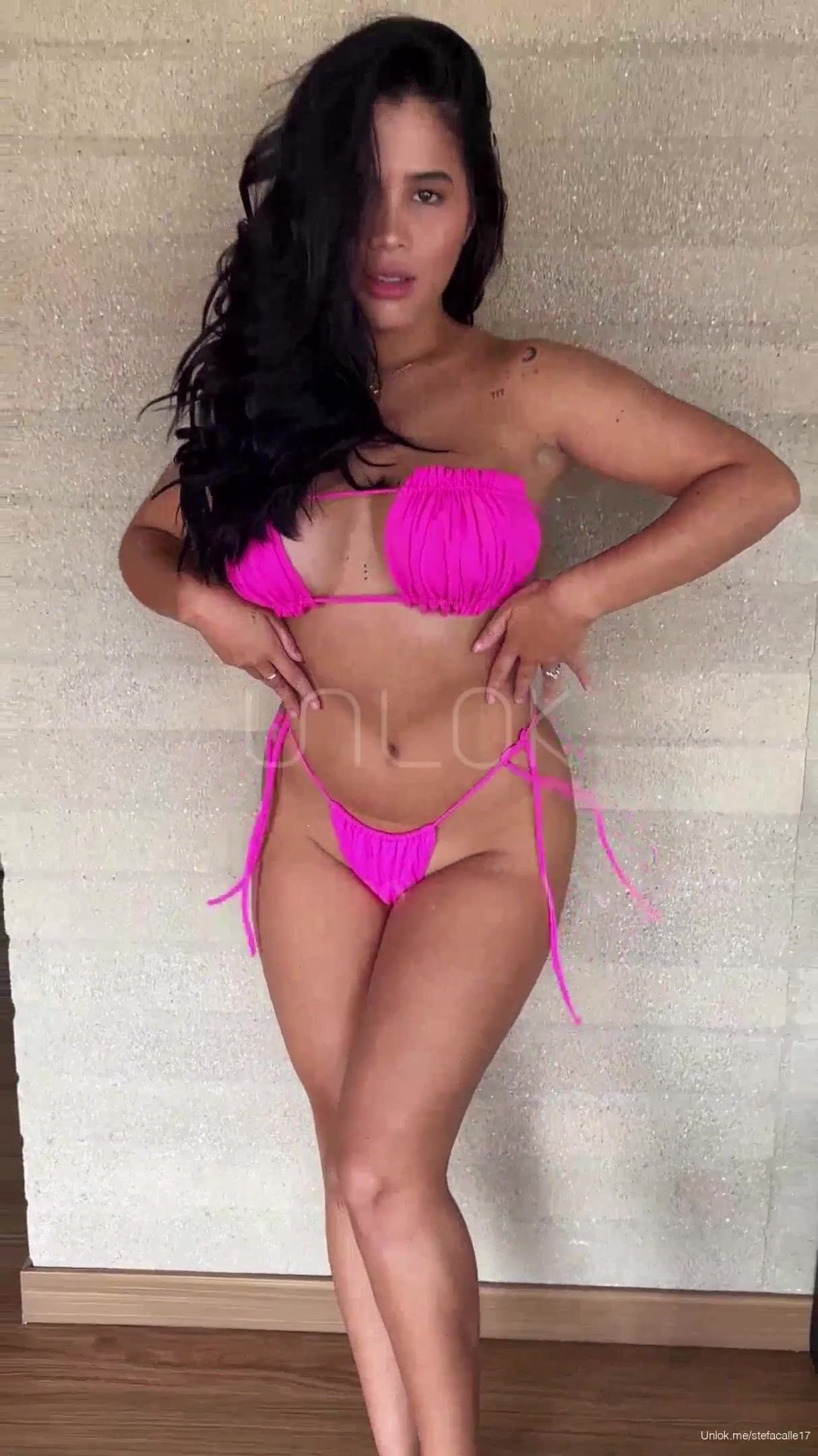 Latina in amazing bikini dances and shows titties Video