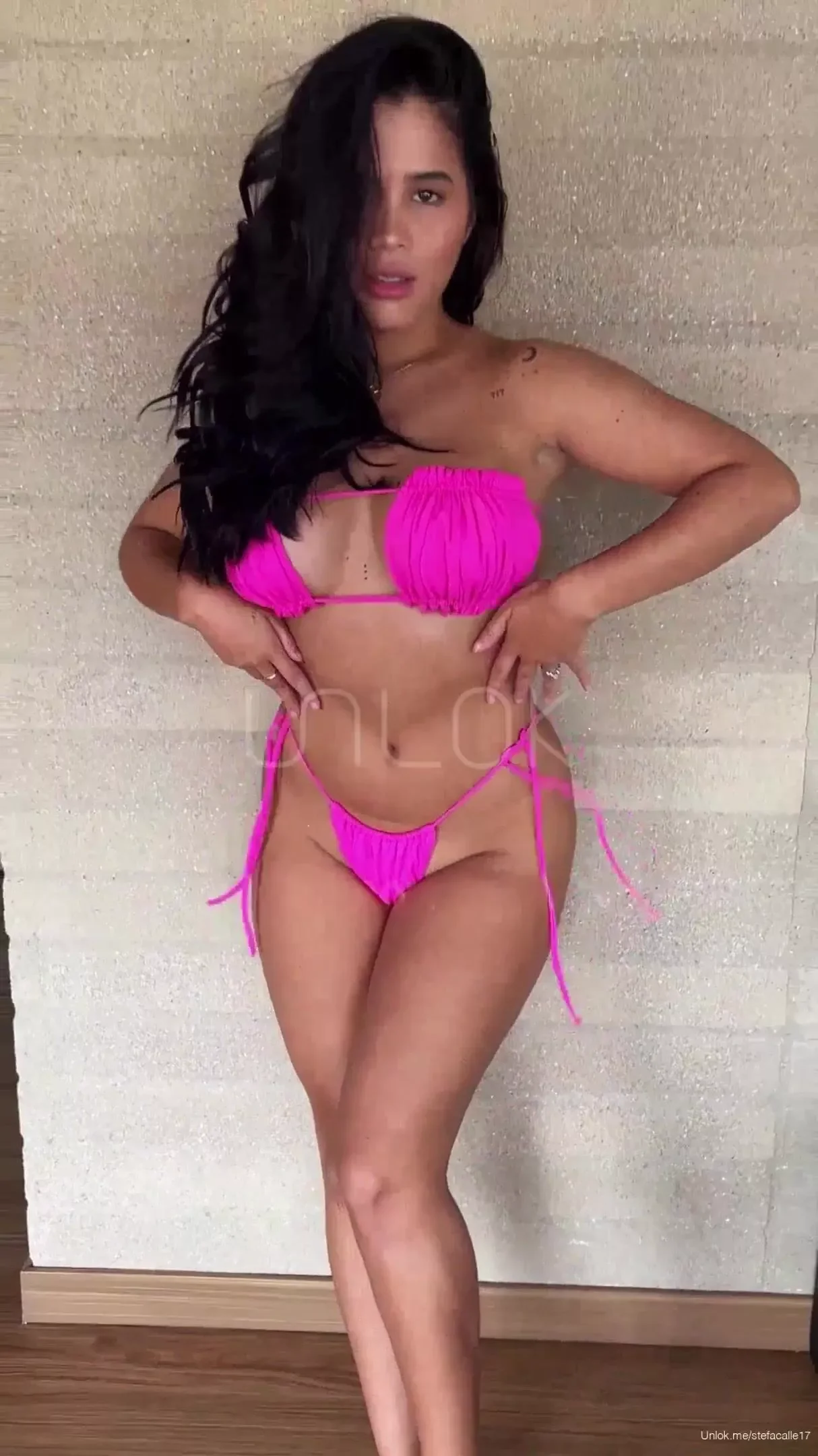 Latina in amazing bikini dances and shows titties Video photo